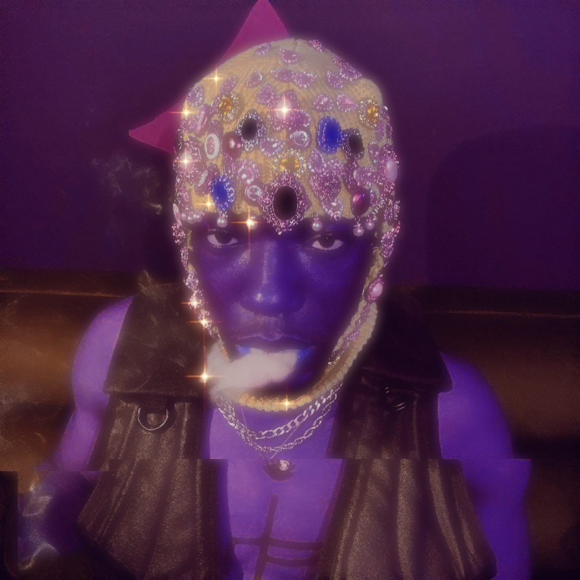Portrait of Ÿusuf ULTRA in purple light and jeweled styling